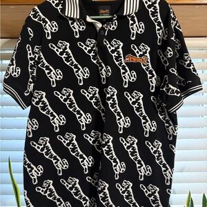 Le Tigre Black Polo with White Tiger Print and Orange Logo